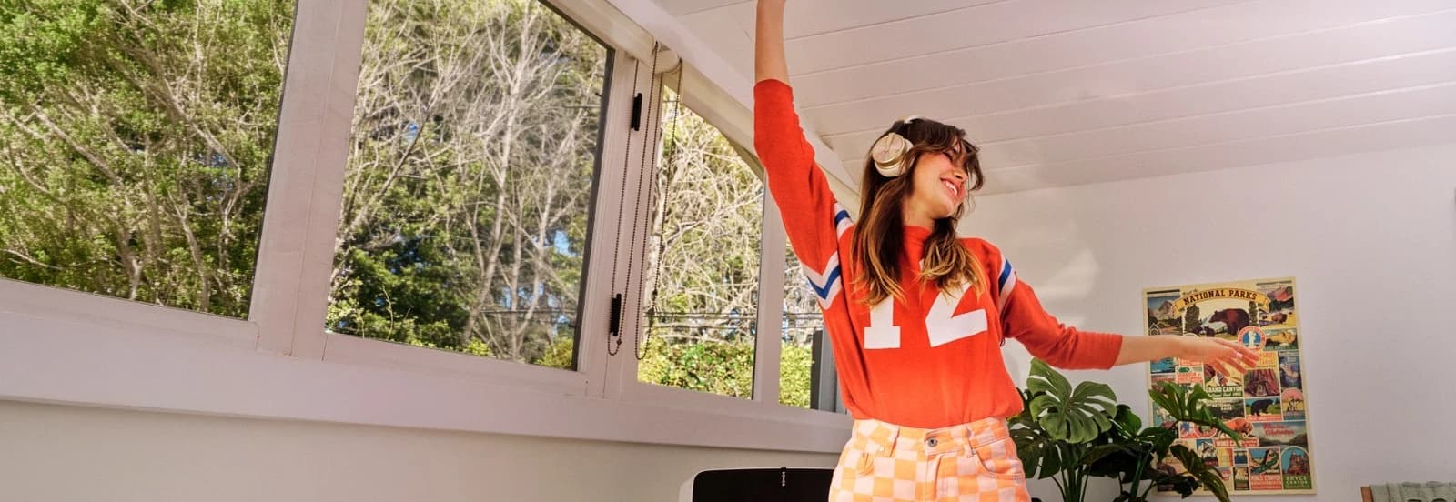 Woman listening to music at home